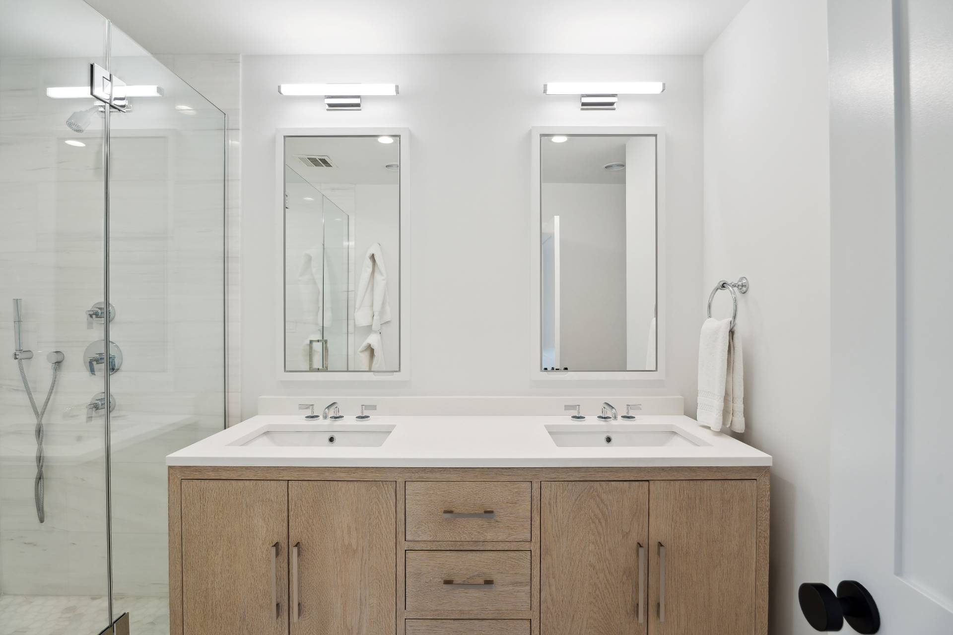 31 East Gate Road Wainscott, NY 11975 - Photo 8 of 20 a bathroom with a sink double vanity and a mirror