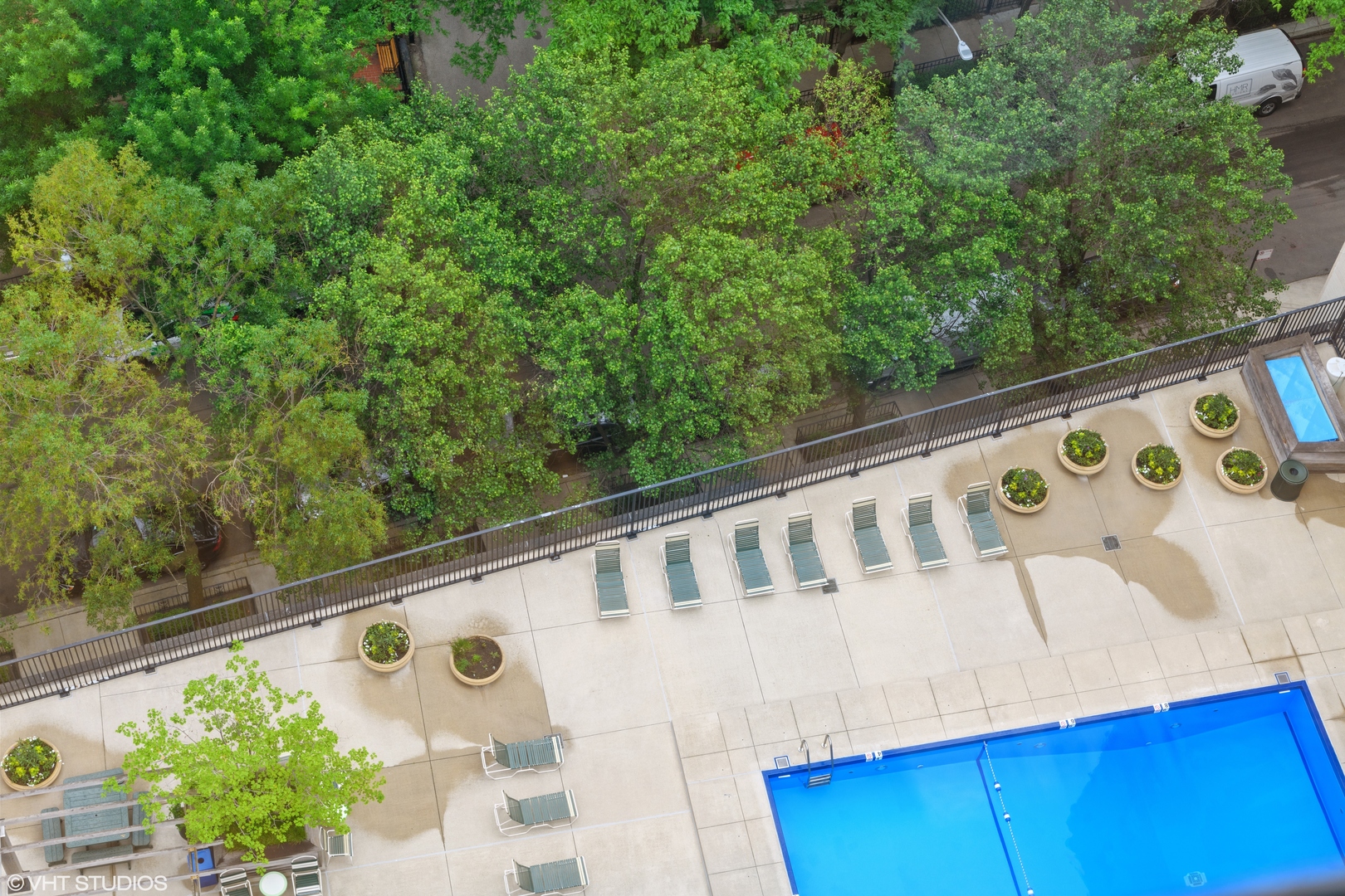 1310 North Ritchie Court, Unit 26C Chicago, IL 60610 - Photo 31 of 34 a view of a balcony with wooden floor