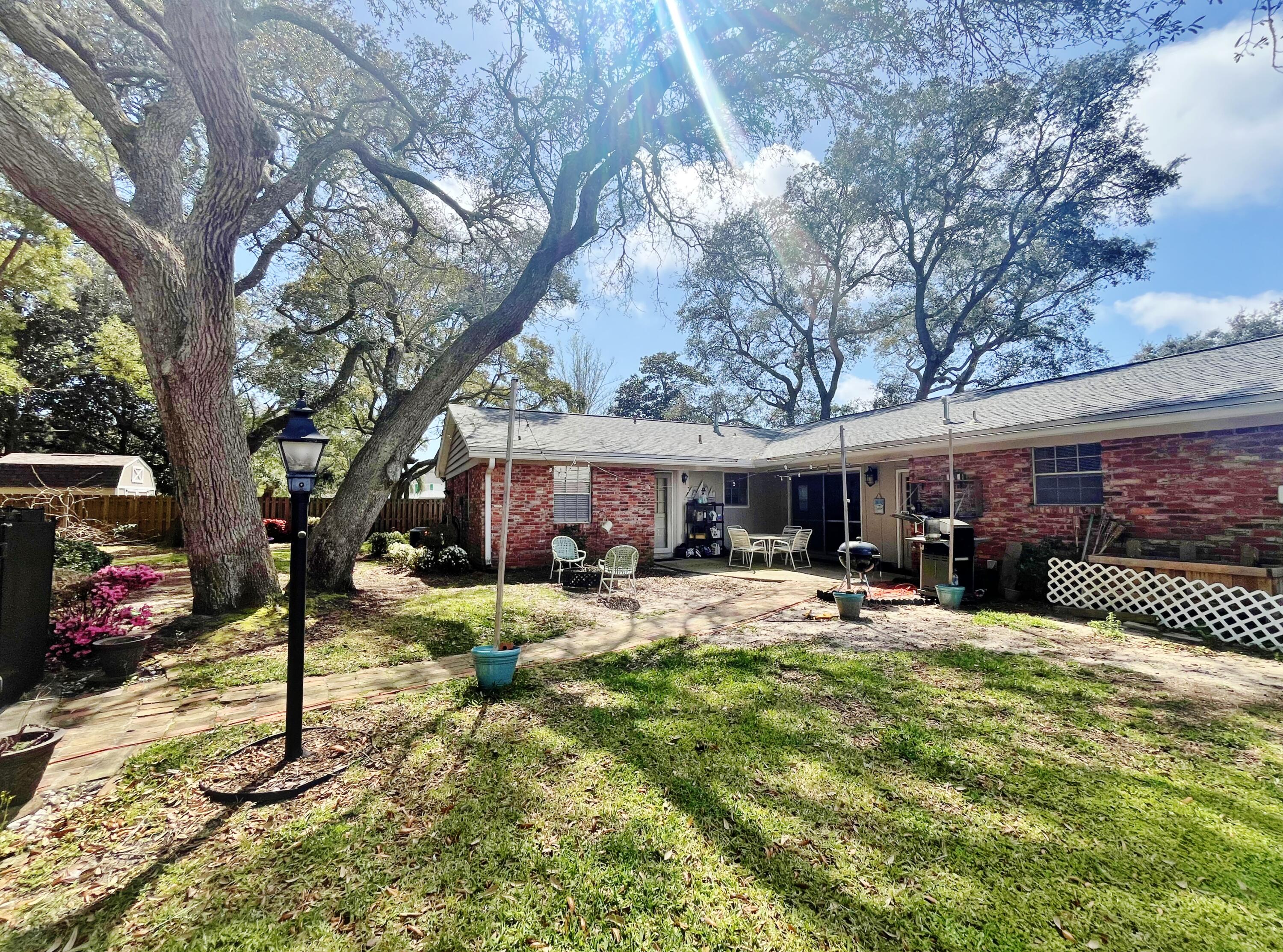 64 Linwood Road Northwest Fort Walton Beach, FL 32547 - Photo 33 of 40 Patio and rear of home