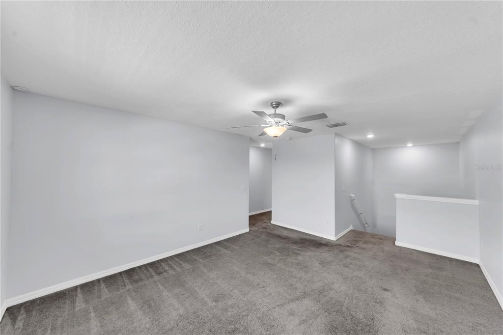 4215 Hanover Drive New Port Richey, FL 34653 - Photo 21 of 46 a view of an empty room with a window
