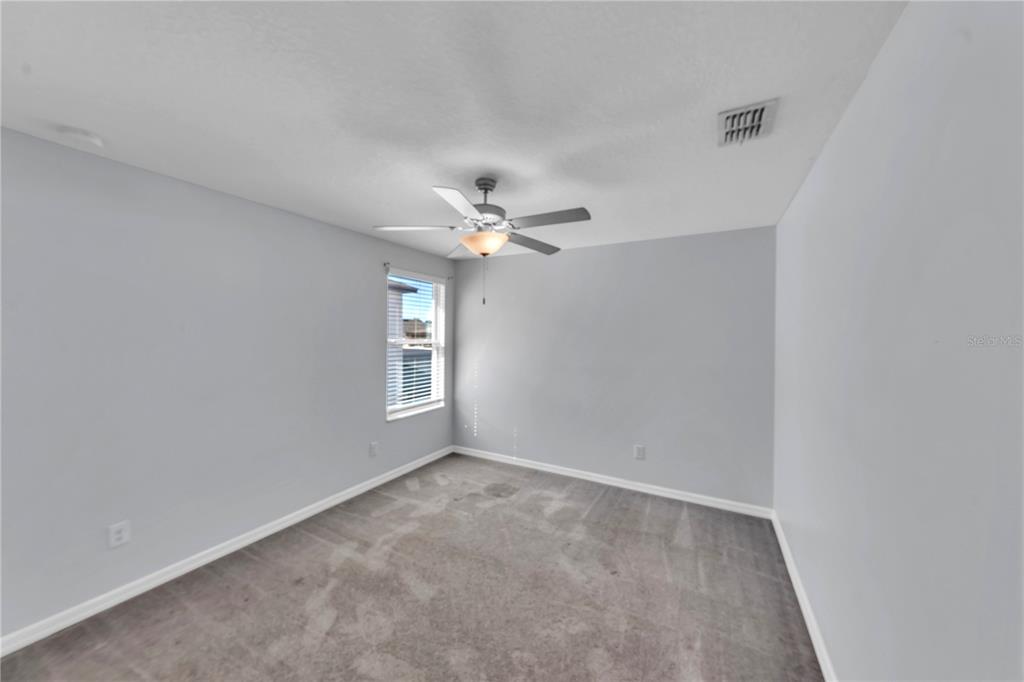 4215 Hanover Drive New Port Richey, FL 34653 - Photo 25 of 46 a view of an empty room with a window