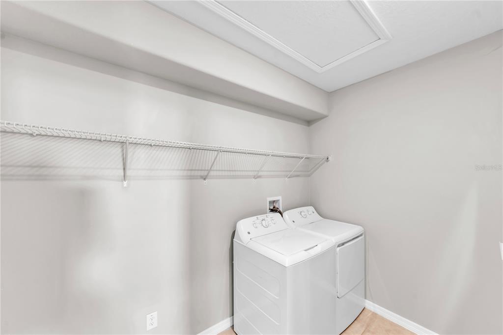 4215 Hanover Drive New Port Richey, FL 34653 - Photo 31 of 46 a utility room with dryer and washer