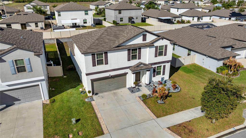 4215 Hanover Drive New Port Richey, FL 34653 - Photo 36 of 46 an aerial view of a house with a yard