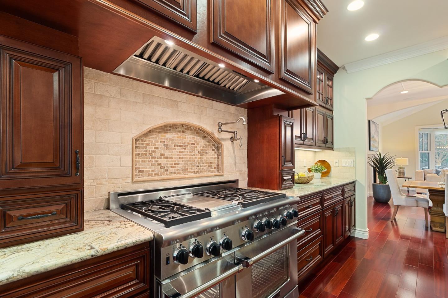1665 Collingwood Avenue San Jose, CA 95125 - Photo 13 of 41 a stove top oven sitting inside of a kitchen