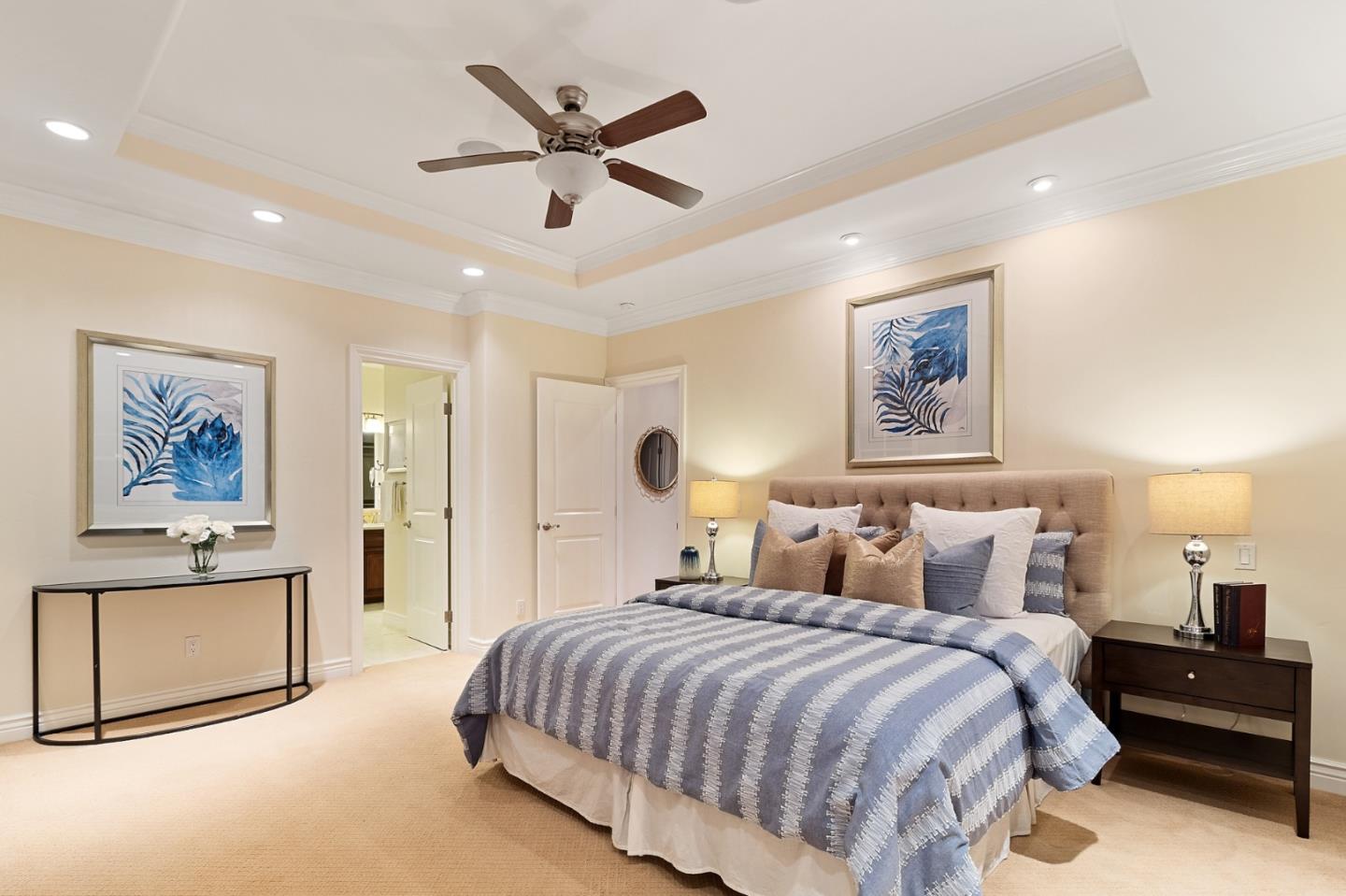 1665 Collingwood Avenue San Jose, CA 95125 - Photo 20 of 41 a spacious bedroom with a bed and a chandelier