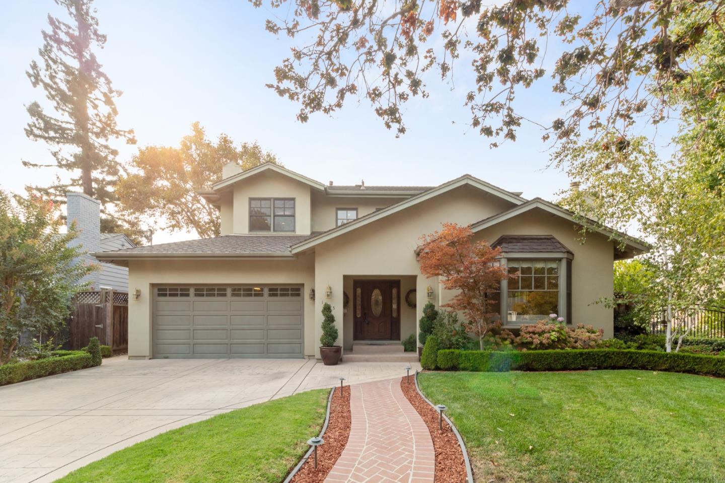 1665 Collingwood Avenue San Jose, CA 95125 - Photo 2 of 41 a front view of a house with a garden and yard