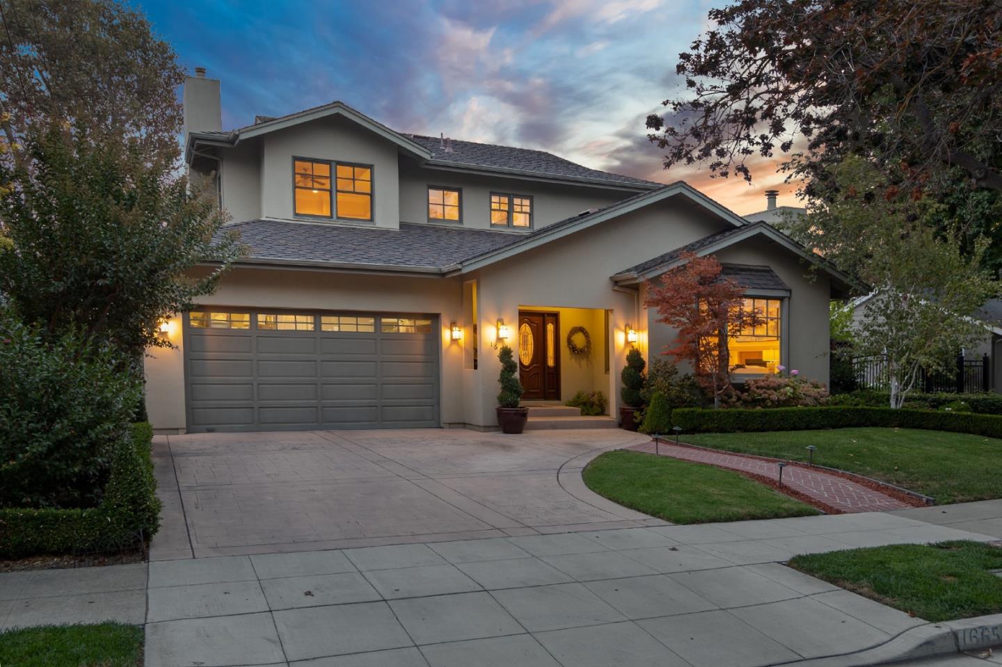 1665 Collingwood Avenue San Jose, CA 95125 - Photo 3 of 41 a view of a house with brick walls and a yard with plants