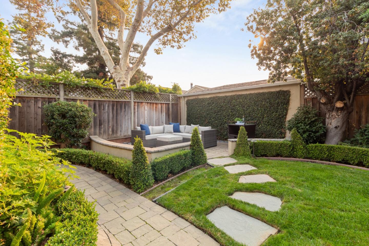 1665 Collingwood Avenue San Jose, CA 95125 - Photo 39 of 41 a view of a backyard with couches plants and large trees
