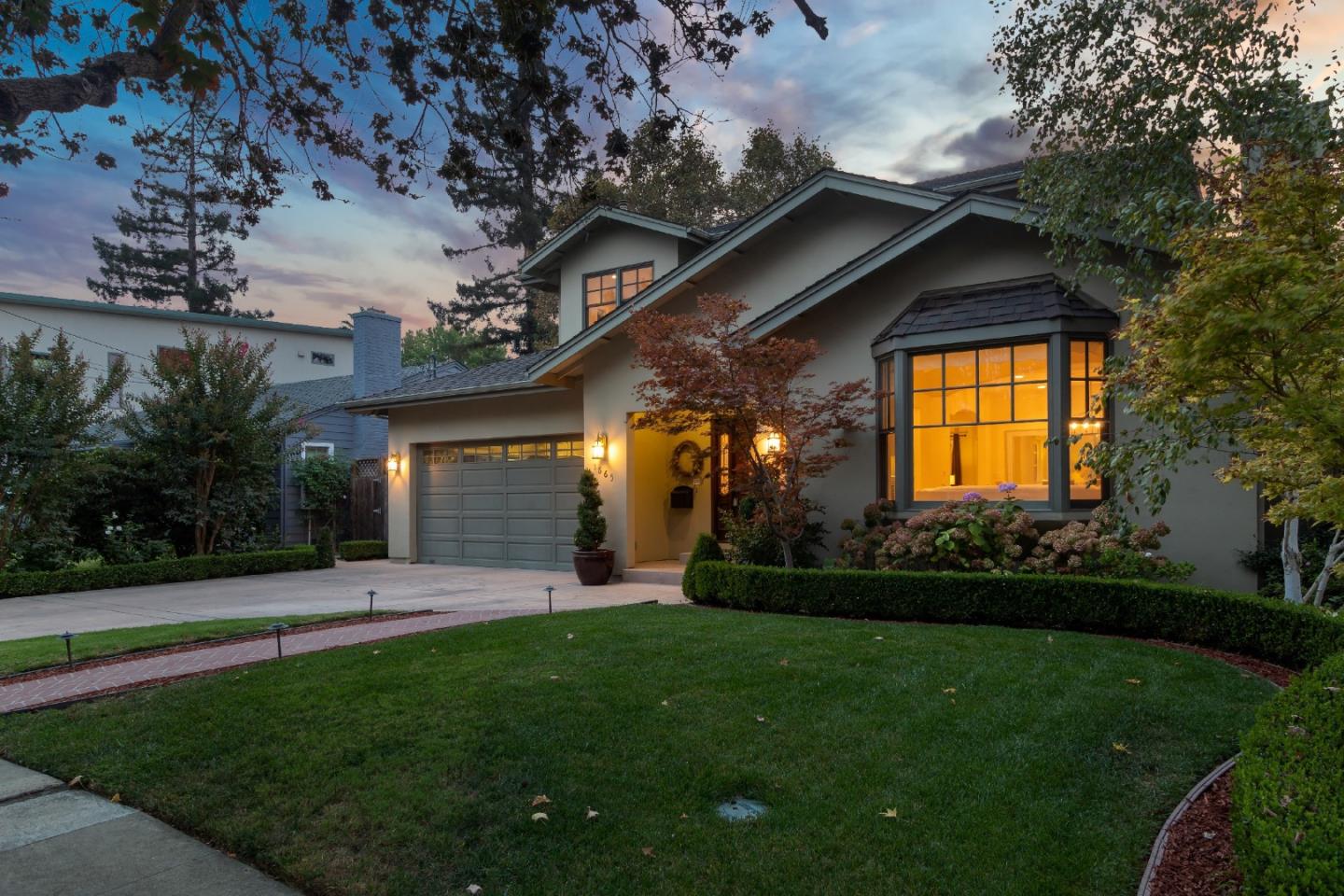 1665 Collingwood Avenue San Jose, CA 95125 - Photo 5 of 41 a view of a house with a large tree and a yard
