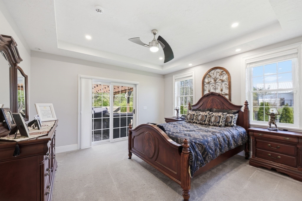 8 Fitch Farm Road Southampton, MA 01073 - Photo 21 of 42 a bedroom with a bed and a window