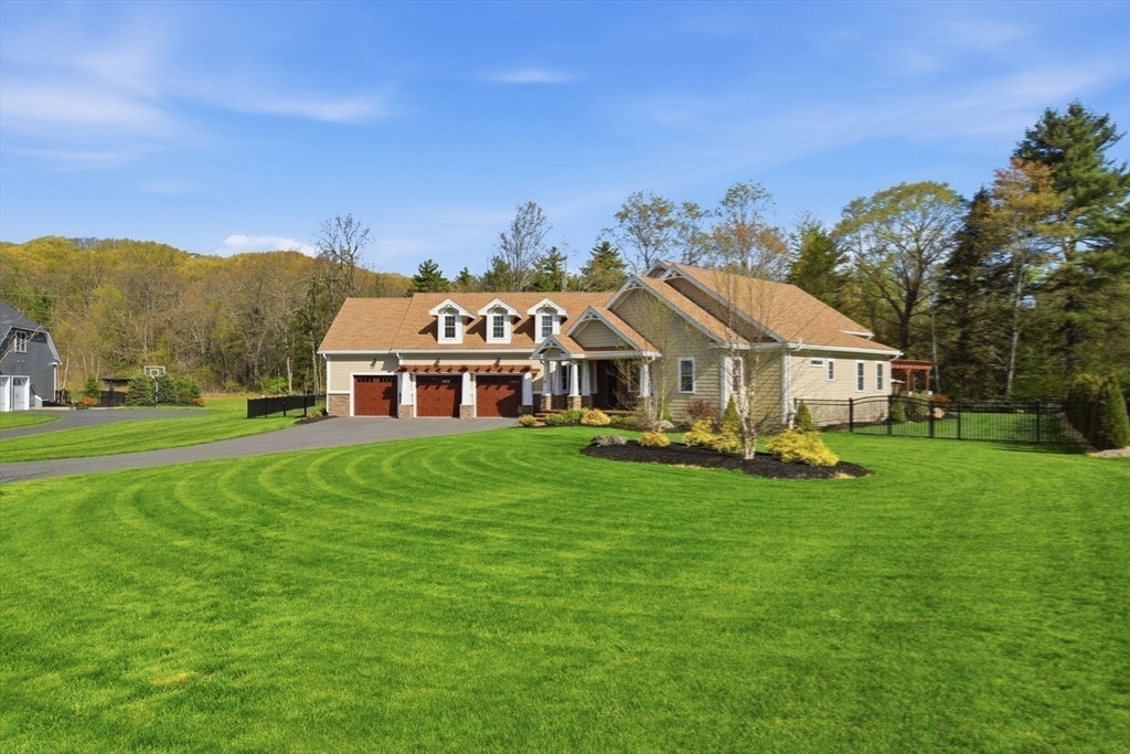 8 Fitch Farm Road Southampton, MA 01073 - Photo 42 of 42 a front view of a house with garden and trees