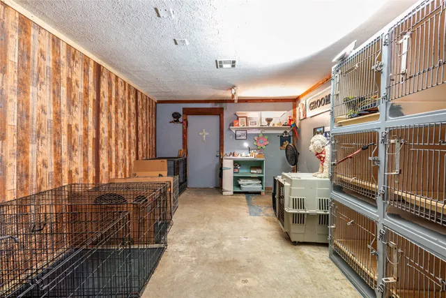 a kitchen with stainless steel appliances granite countertop a sink dishwasher stove and refrigerator