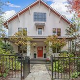 a view of house with outdoor space and sitting area