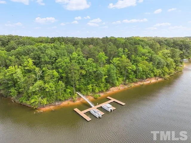 a view of a lake with a city