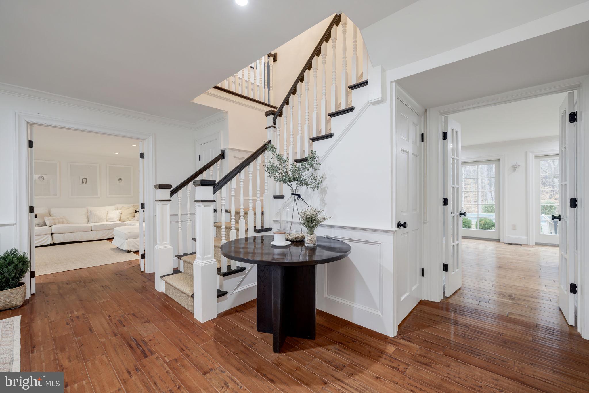 8701 Belmart Road Potomac, MD 20854 - Photo 4 of 39 Hardwood Flooring Throughout Main and Upper Levels