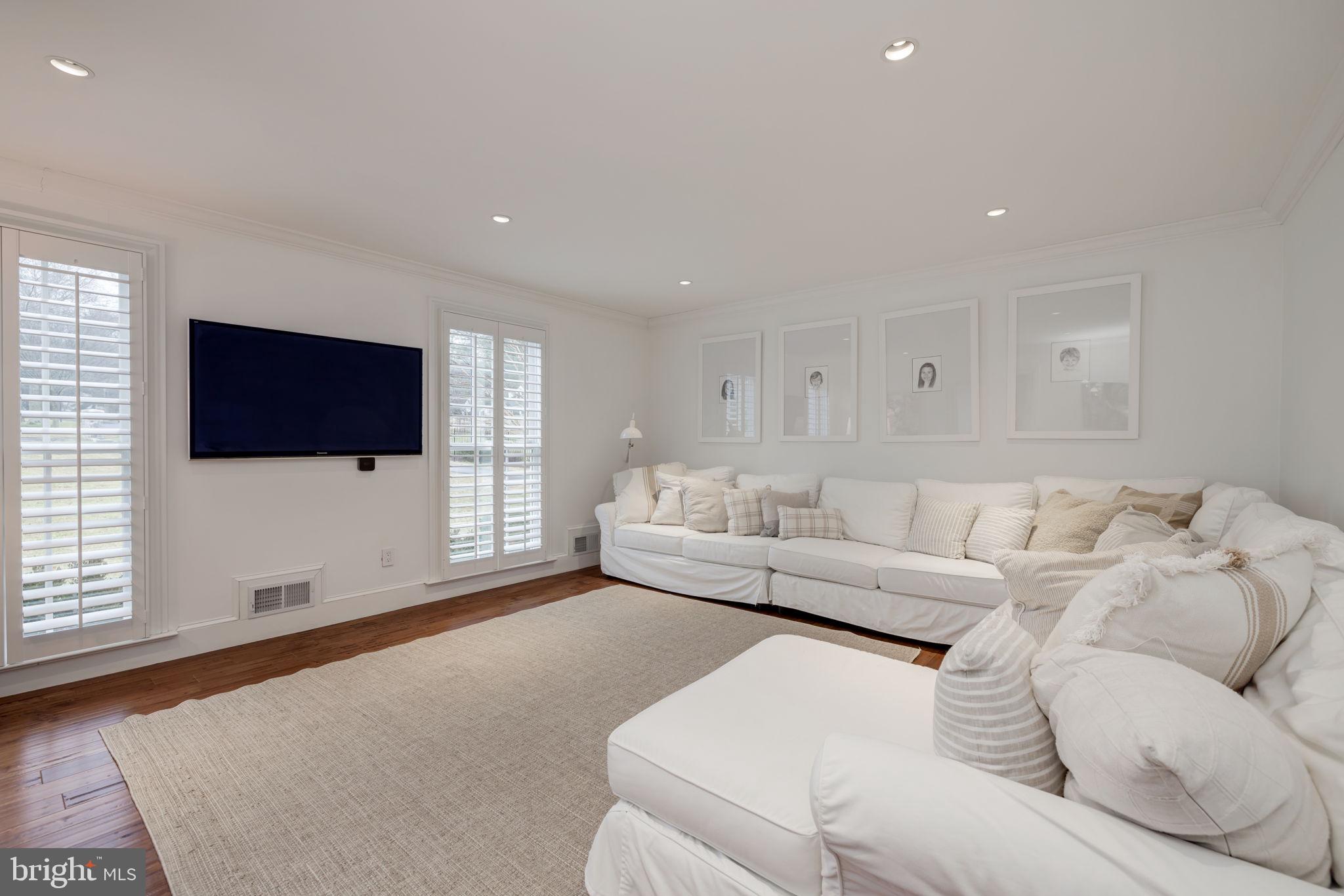 8701 Belmart Road Potomac, MD 20854 - Photo 6 of 39 Living Room with Crown and Baseboard Molding