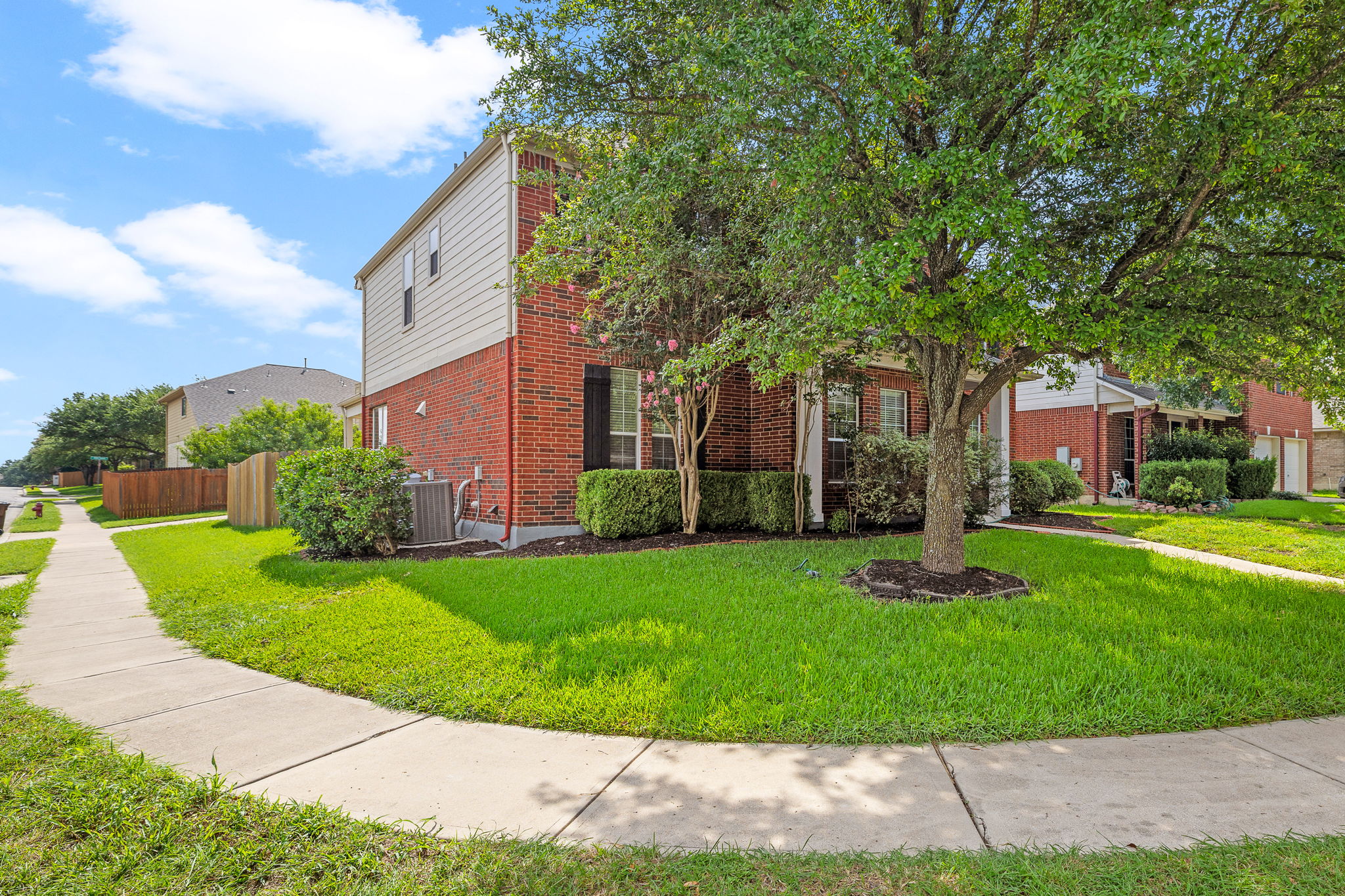676 Rusk Road Round Rock, TX 78665 - Photo 4 of 35 Featuring a side entry garage tucked behind the home