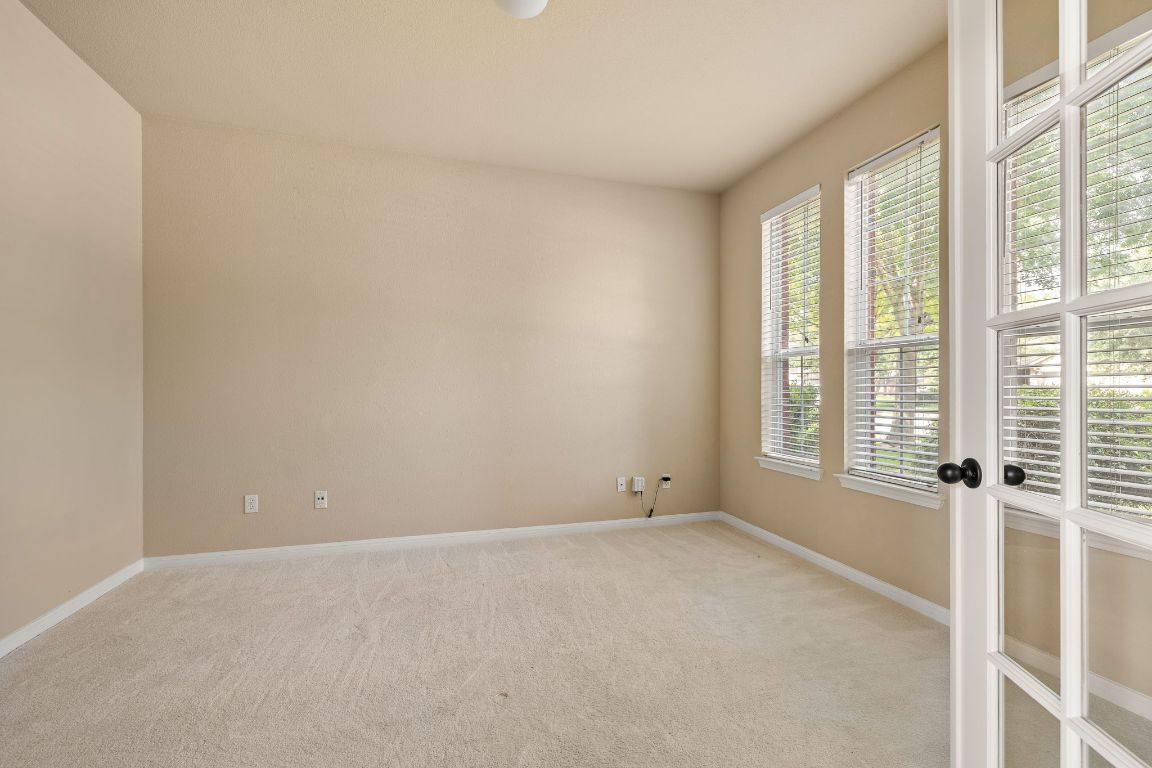 676 Rusk Road Round Rock, TX 78665 - Photo 6 of 35 Dedicated study with french doors