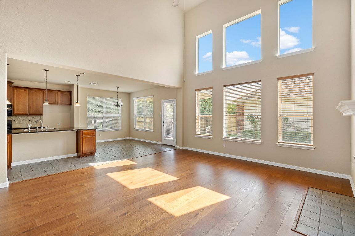 676 Rusk Road Round Rock, TX 78665 - Photo 9 of 35 A wall of windows allows for ample natural light
