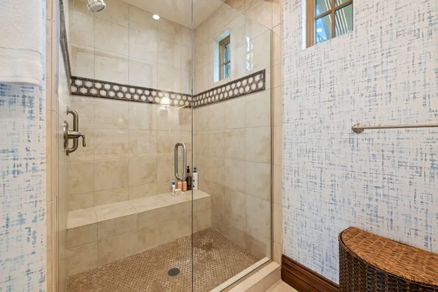 a view of a house with fountain in front of it