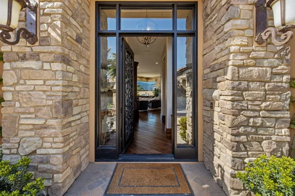 a view of a brick house with a outdoor space