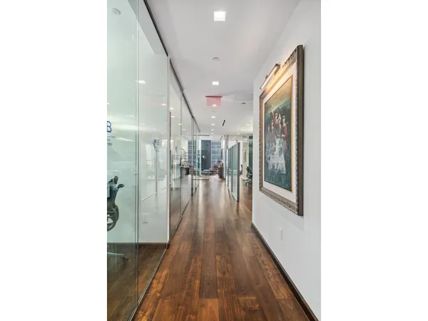a view of a hallway with a white walls