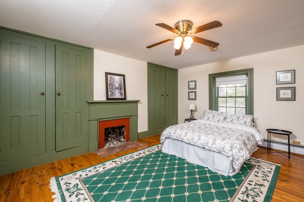 417 Todd Road Mount Sidney, VA 24467 - Photo 17 of 50 a bedroom with a bed and a fireplace