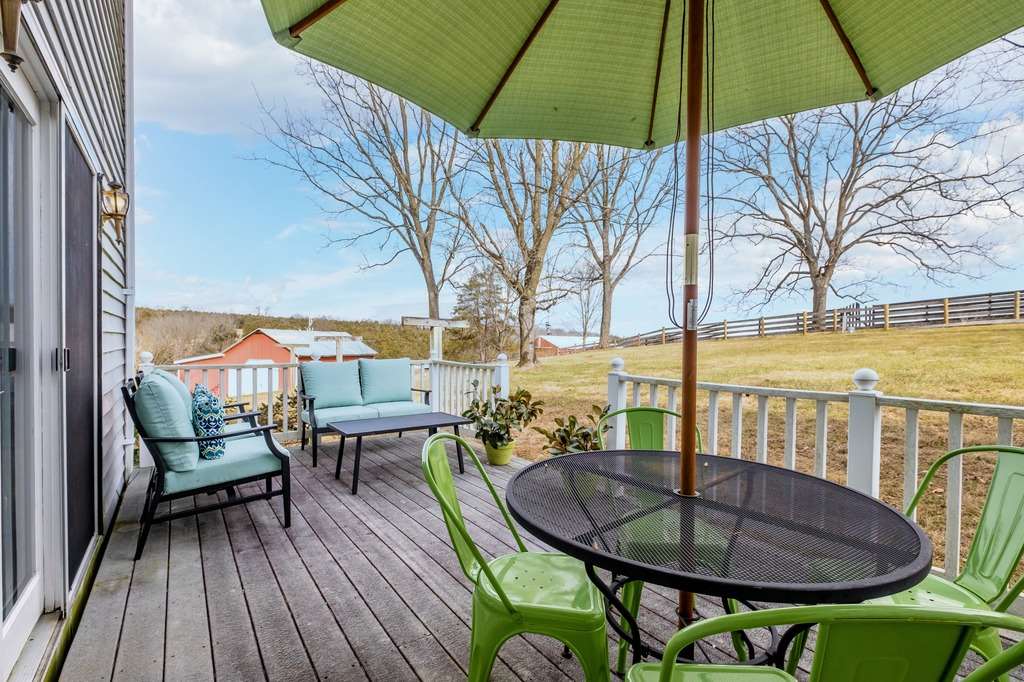 417 Todd Road Mount Sidney, VA 24467 - Photo 38 of 50 a balcony with table and chairs