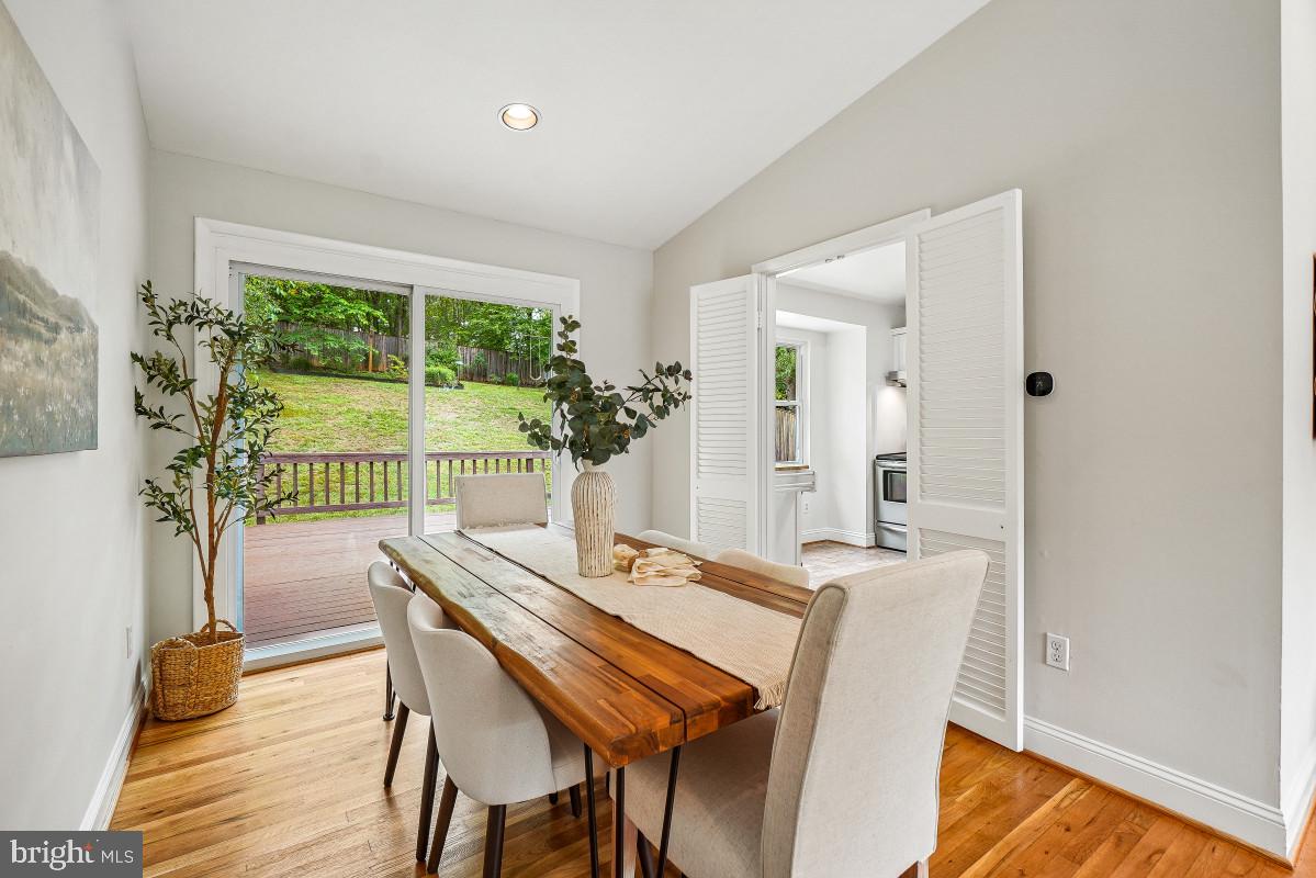 827 Caddington Avenue Silver Spring, MD 20901 - Photo 12 of 45 a view of a dining room with furniture window and wooden floor