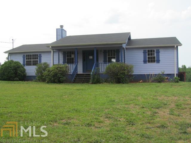 800 Baughs Cross Road West Point, GA 31833 - Photo 1 of 1 a view of a house with garden and yard