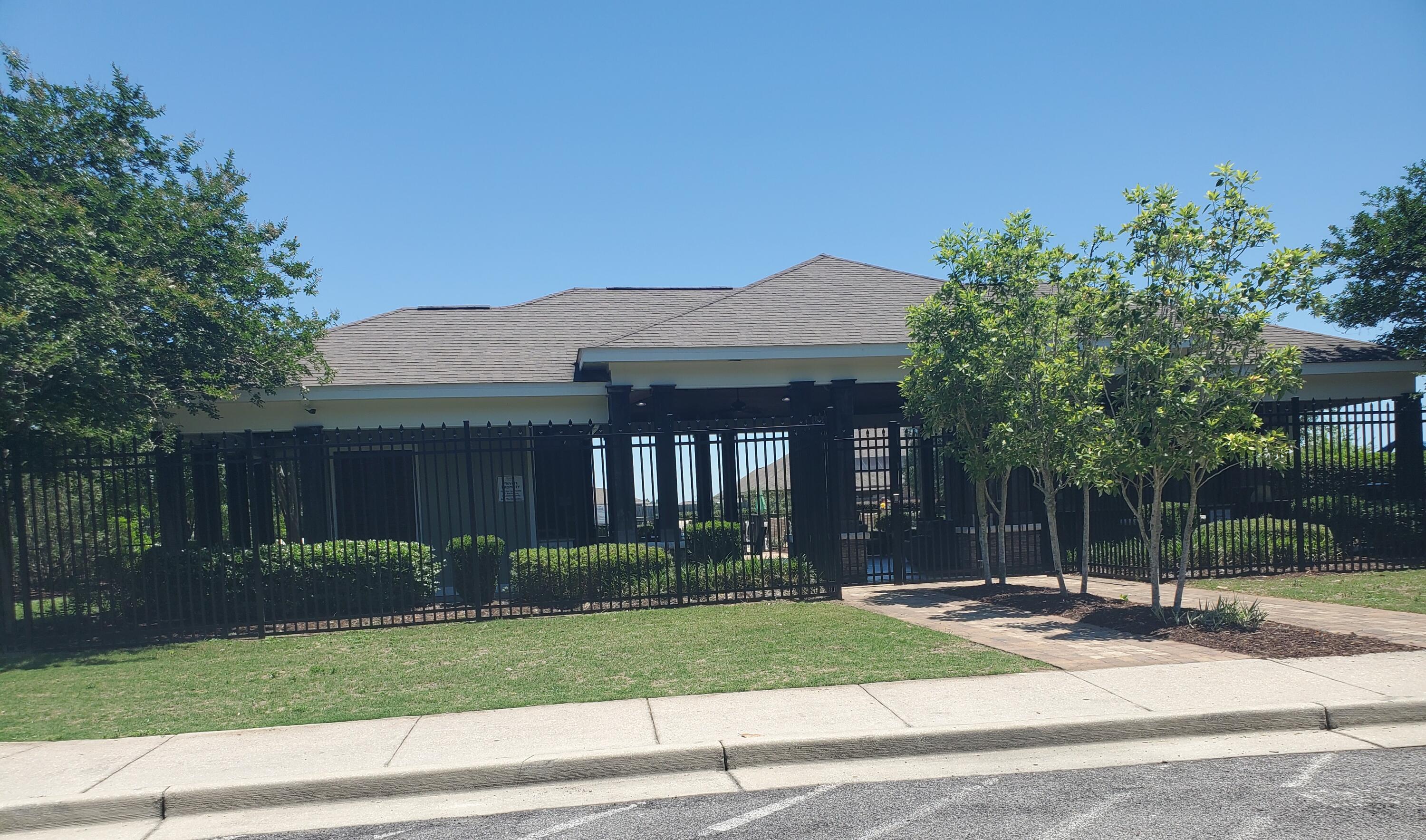 809 Moorhen Way Crestview, FL 32539 - Photo 23 of 24 a front view of house with a garden