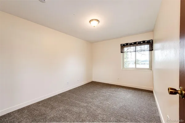 an empty room with a natural light