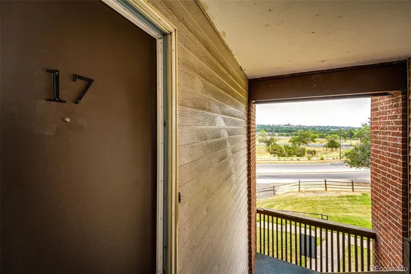 a view of a room with a large window