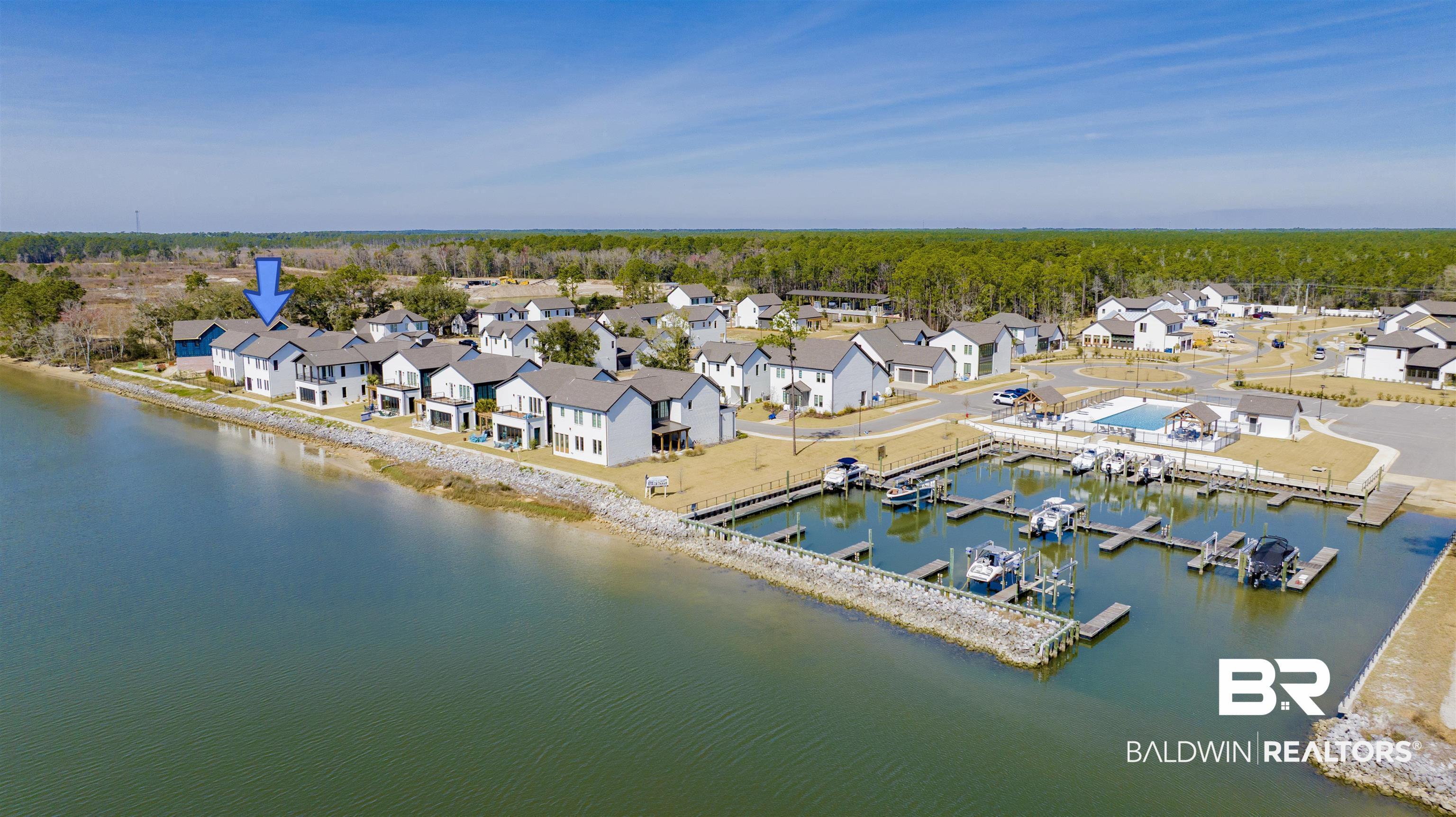 861 Inlet Circle Gulf Shores, AL 36542 - Photo 48 of 54 Aerial perspective of suburban area featuring a nearby body of water