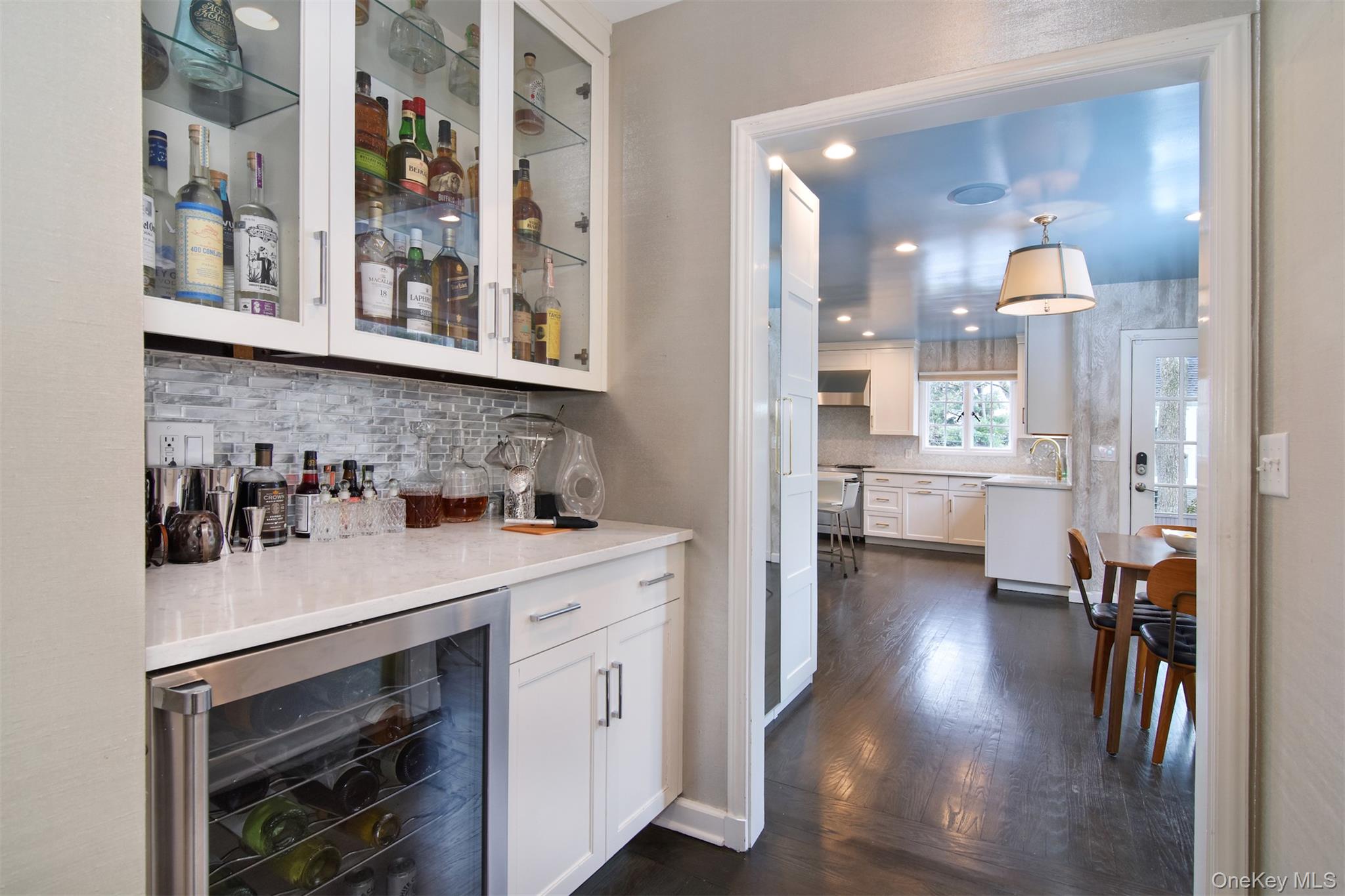 30 Locust Lane Bronxville, NY 10708 - Photo 11 of 28 a kitchen with a sink cabinets and wooden floor