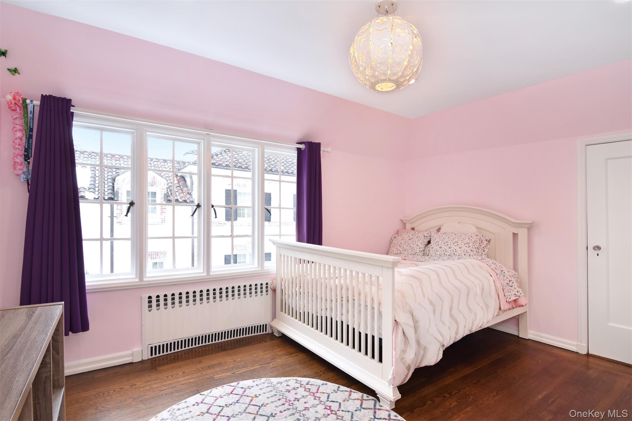 30 Locust Lane Bronxville, NY 10708 - Photo 17 of 28 a bedroom with a bed and a window