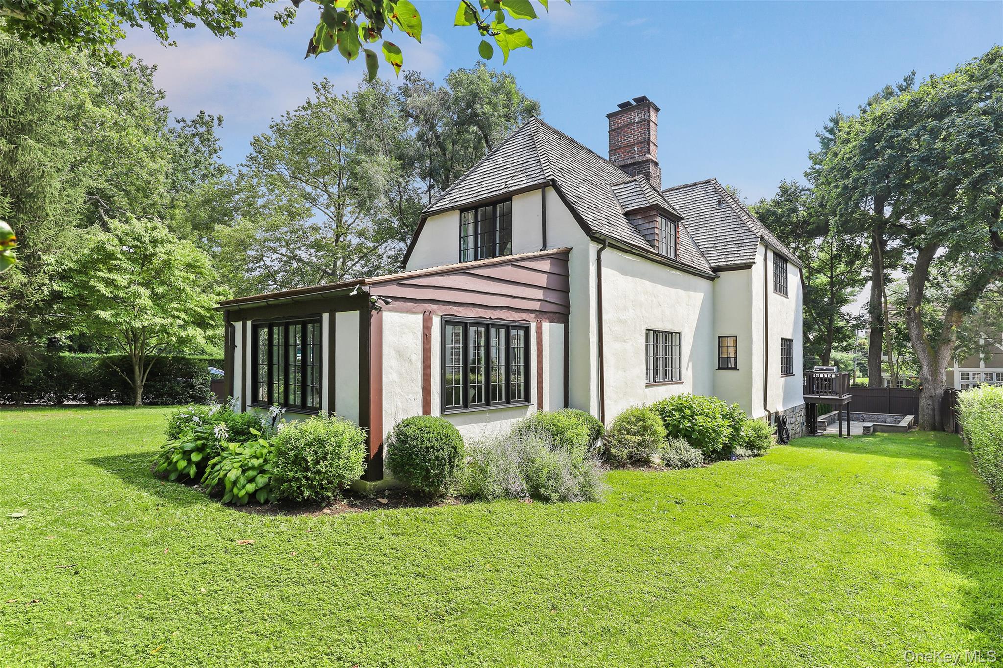 30 Locust Lane Bronxville, NY 10708 - Photo 23 of 28 a front view of a house with garden