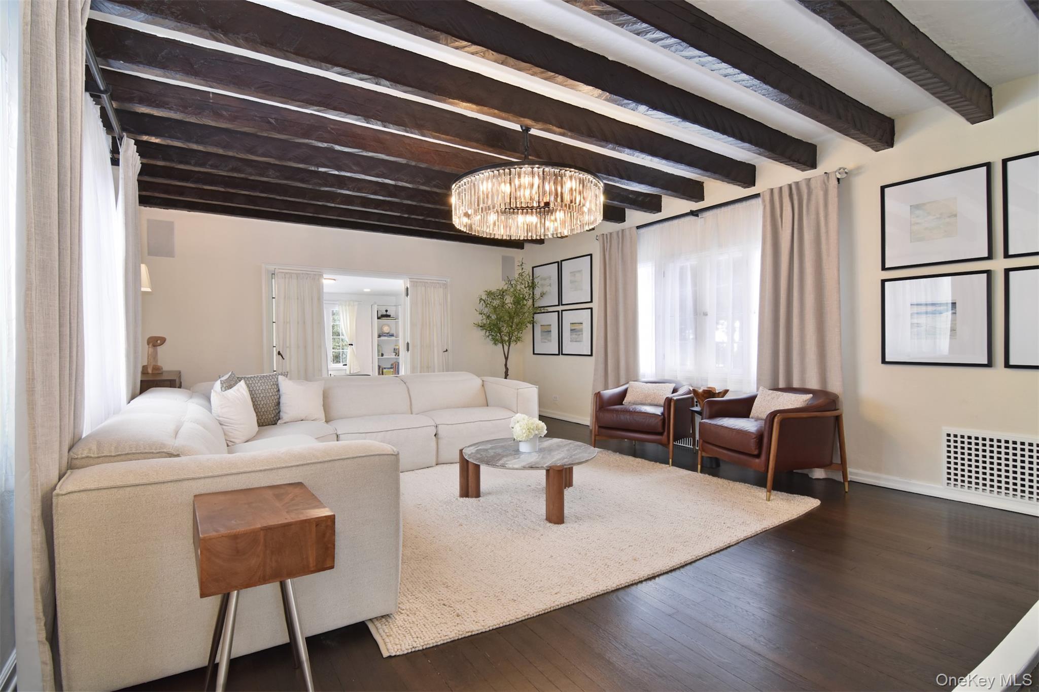 30 Locust Lane Bronxville, NY 10708 - Photo 4 of 28 a living room with furniture and chandelier