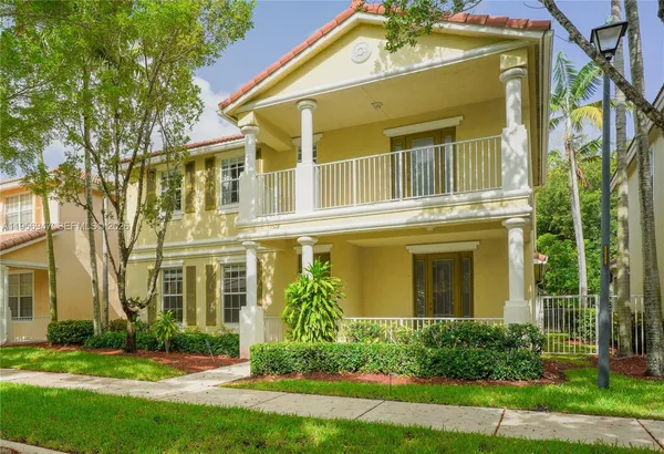 front view of a house with a yard