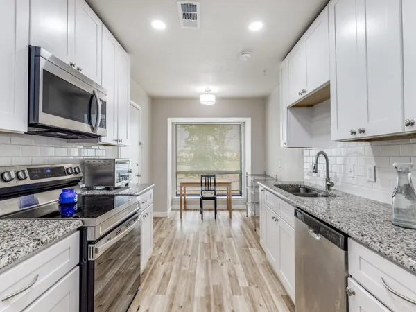 $299,900 | 10017 Regal Park Lane, Unit 205, Dallas, TX 75230