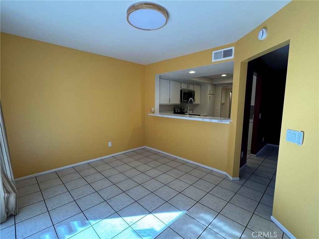 1254 Sand Creek Road San Dimas, CA 91773 - Photo 12 of 26 an empty room with windows