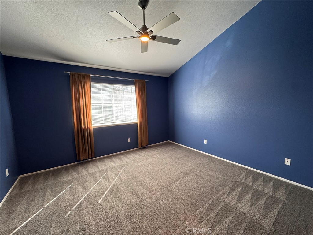 1254 Sand Creek Road San Dimas, CA 91773 - Photo 15 of 26 an empty room with windows and closet