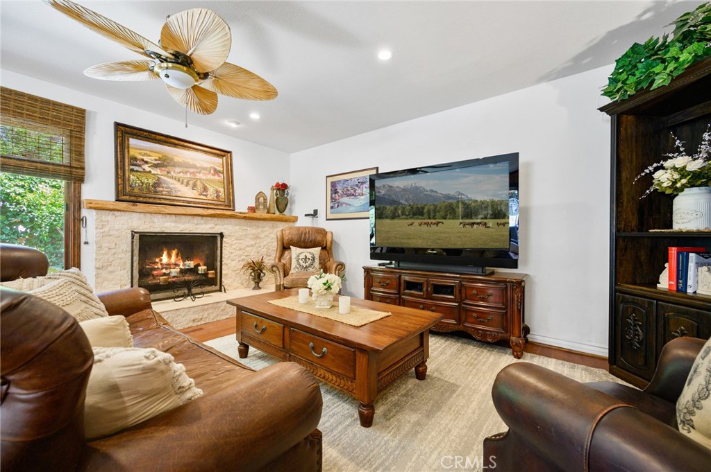 28111 Via Rueda San Juan Capistrano, CA 92675 - Photo 10 of 30 a living room with furniture and a flat screen tv