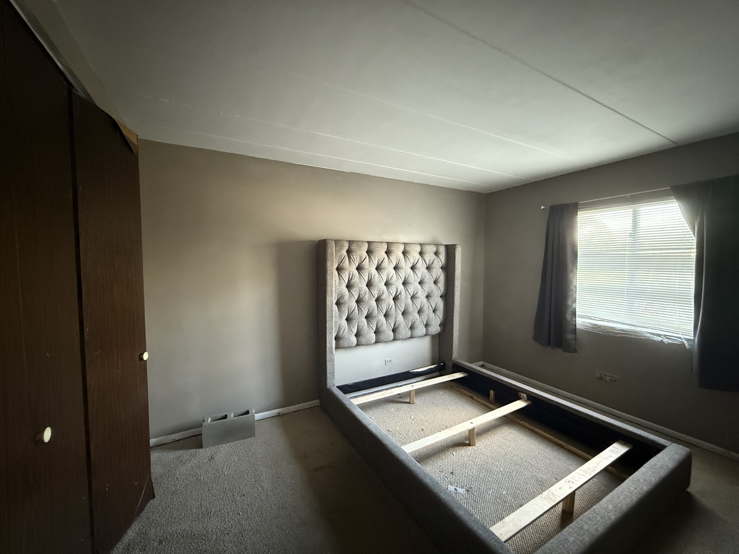 17006 Novak Drive, Unit 102 Hazel Crest, IL 60429 - Photo 5 of 6 an empty room with windows