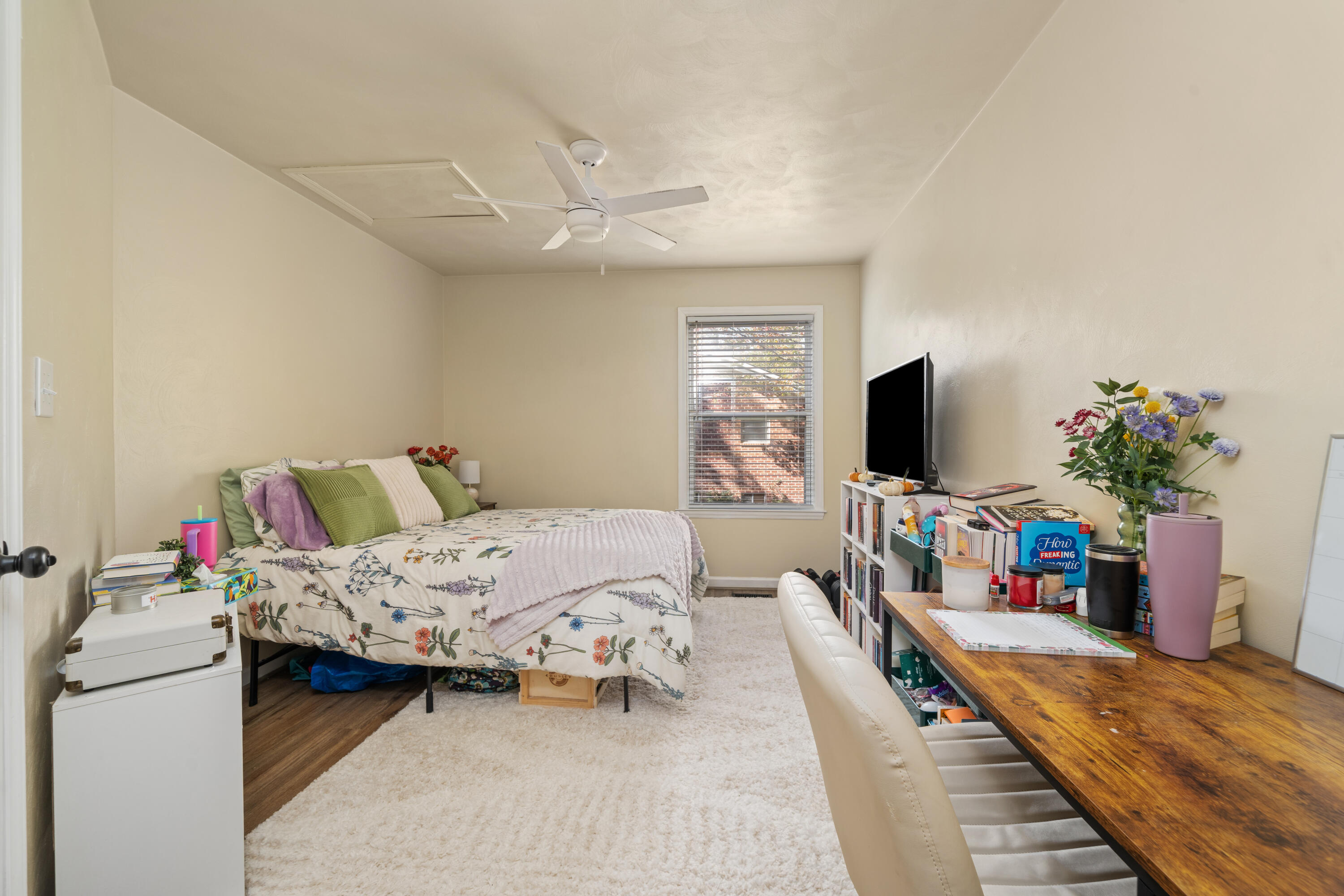 191 Pin Oak Drive Blue Ridge, VA 24064 - Photo 14 of 26 a bedroom with a bed and a flat screen tv