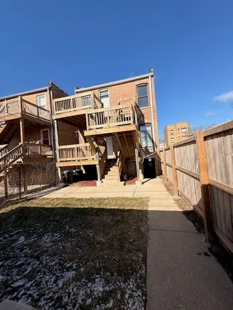 a view of a street with car parked