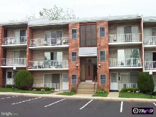 809 Red Lion Road Philadelphia, PA 19115 - Photo 1 of 1 a front view of a building with garden