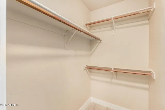 a view of a house with basketball court