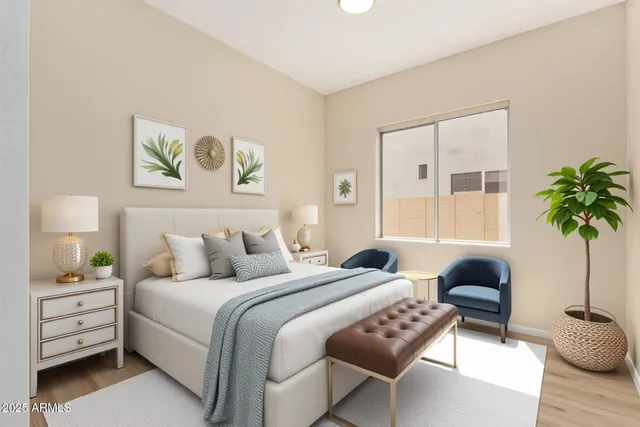 a view of a yard with a table and chairs under an umbrella