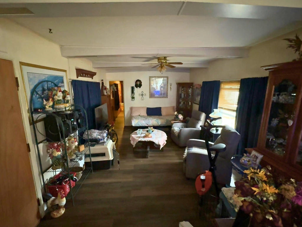 7 Oriole Drive Chicopee, MA 01020 - Photo 3 of 9 a living room with furniture and a flat screen tv